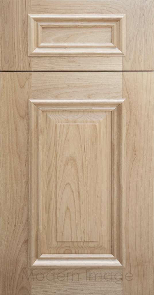 Heritage custom cabinets in a Blondie Stain, classic raised panel doors, and modern flat slab drawer fronts.